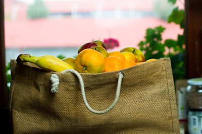 fruits held in reuseable bag