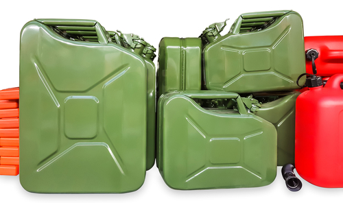 various metal green cans on white background