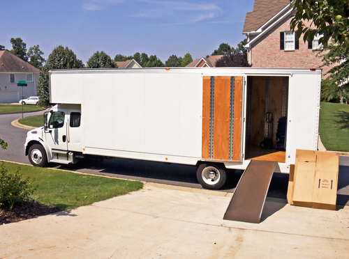 side view of white moving truck