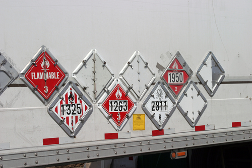 various hazard placards side of truck