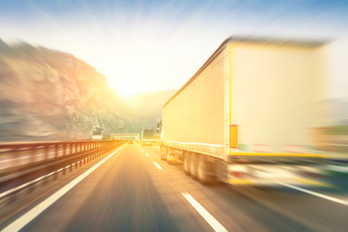 truck speeding by on highway