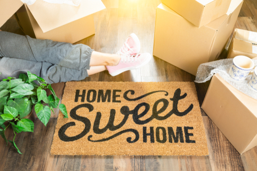 setting down welcome mat new home
