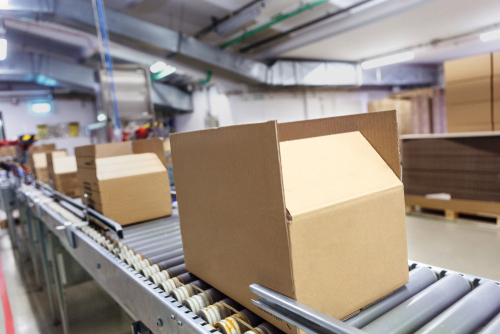 cardboard boxes on conveyer belt