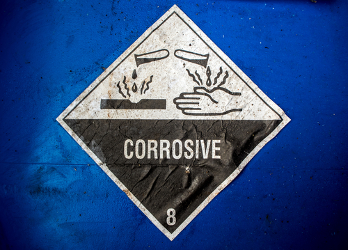 corrosive materials warning label