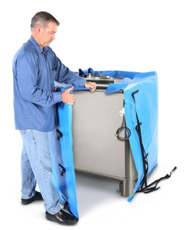 man using 300 gallon tote