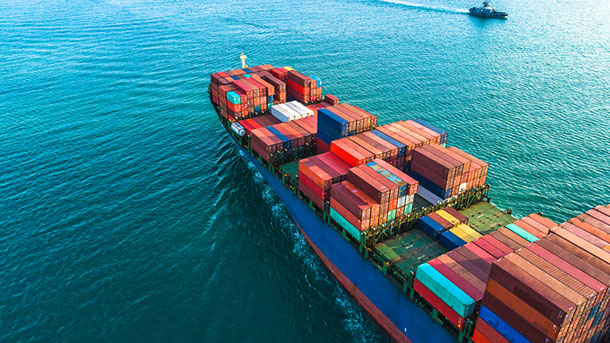 shipping containers on boat at sea