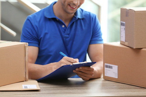 courier fillling out paperwork