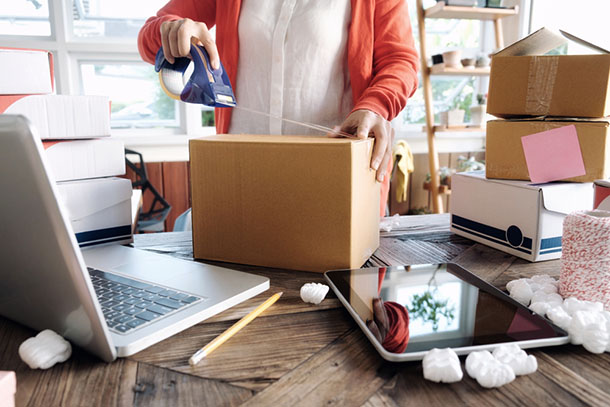 A box being packed for shipping