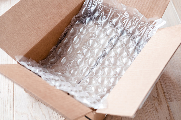 a box with bubble wrap laid on the inside